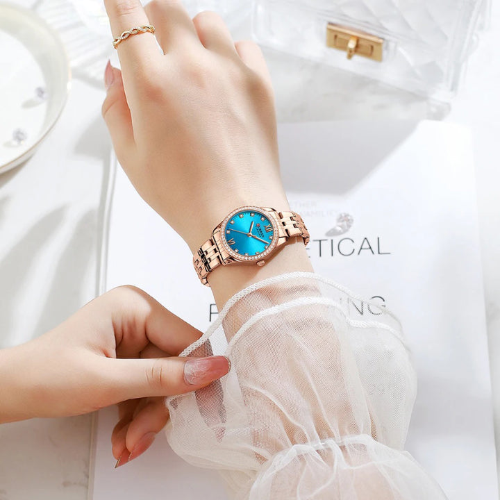 Women's Rhinestone Accented Quartz Watch with Sword-Shaped Pointer