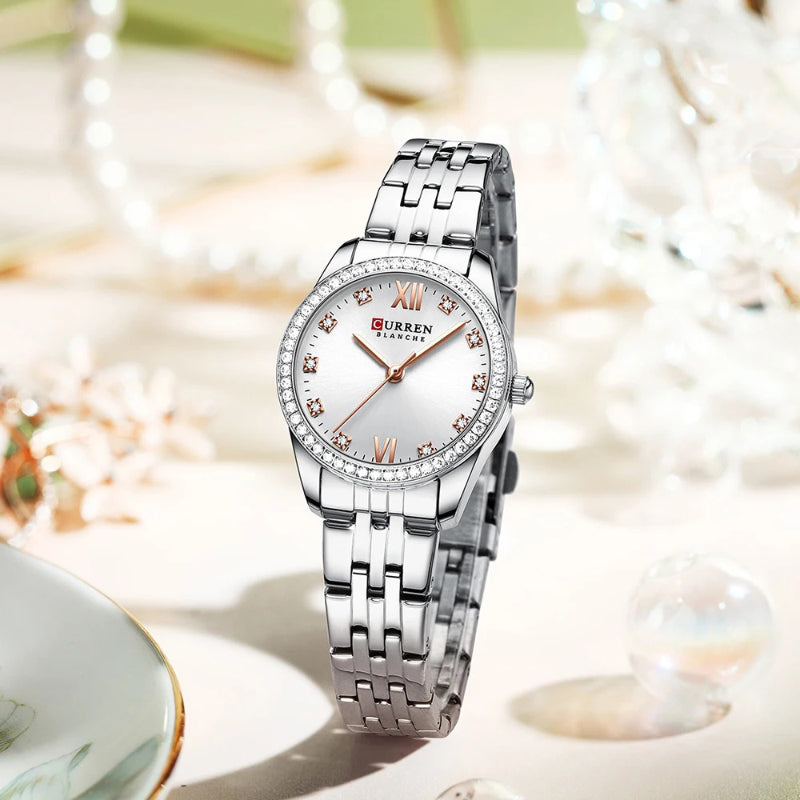 Women's Rhinestone Accented Quartz Watch with Sword-Shaped Pointer