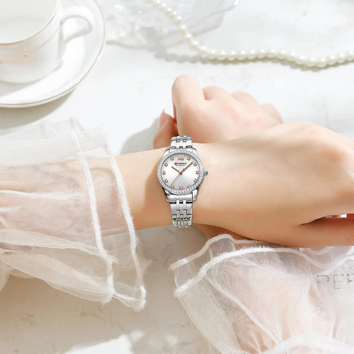 Women's Rhinestone Accented Quartz Watch with Sword-Shaped Pointer