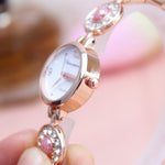 Women's Lustrous Rhinestone and Pearl Bejeweled Bracelet Quartz Watches